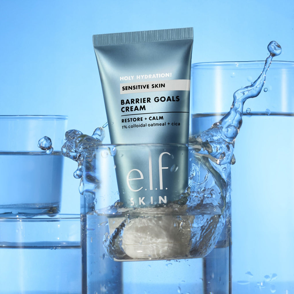 e.l.f. Skin Barrier Goals Cream tube with water splash on a blue background